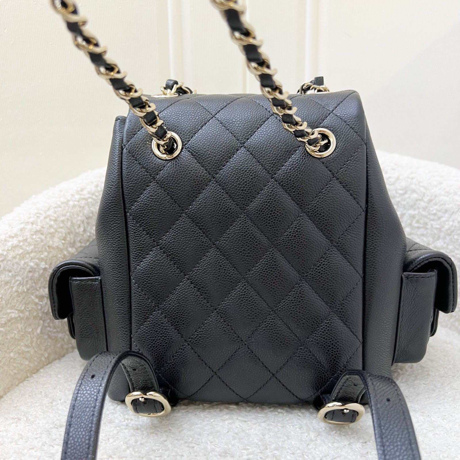 Chanel 23K Triple Pocket Duma Backpack in Black Caviar and LGHW (Model: AS4399) · v7