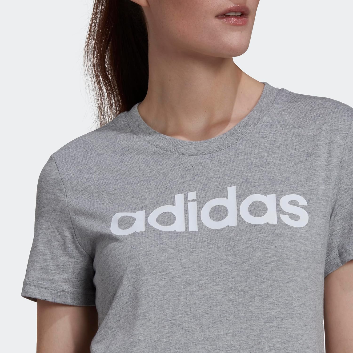 เสื้อยืดลายโลโก้ Slim Essentials จากแบรนด์ adidas Women's Loungewear
