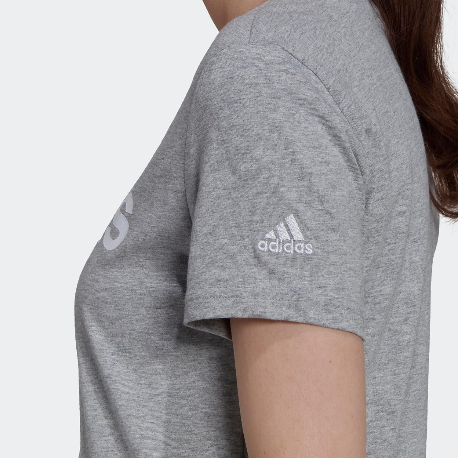 เสื้อยืดลายโลโก้ Slim Essentials จากแบรนด์ adidas Women's Loungewear