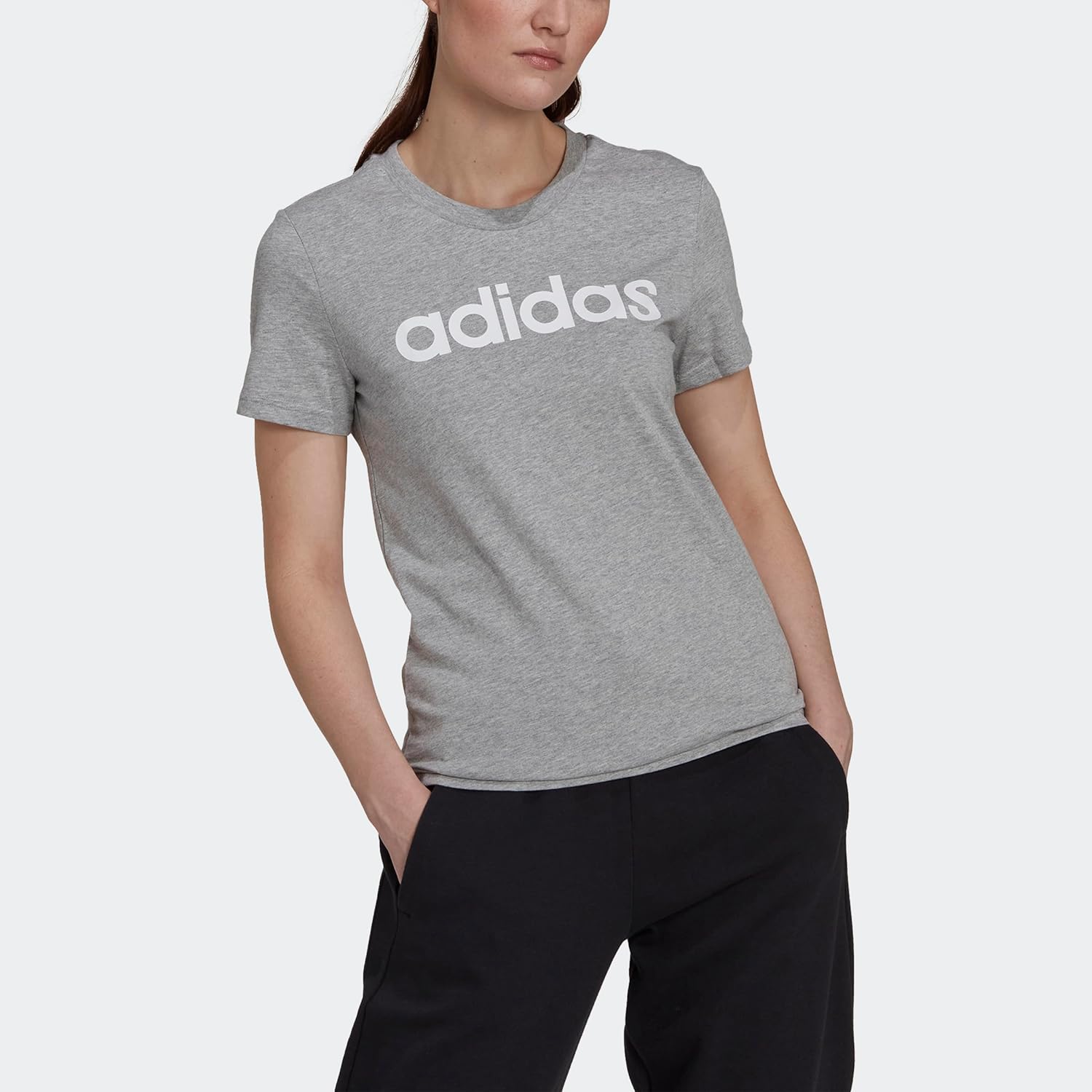 เสื้อยืดลายโลโก้ Slim Essentials จากแบรนด์ adidas Women's Loungewear