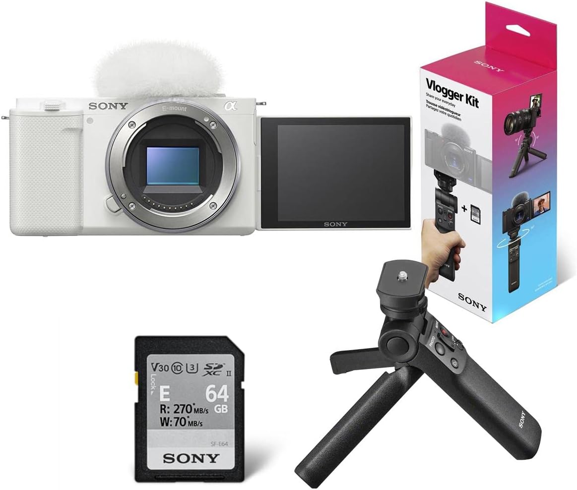 Sony ZV-E10 APS-C Mirrorless Interchangeable Lens Vlogging Camera, White - Bundle ACCVC1 Vlogger Accessory Kit (Shooting Grip  64GB UHS-II SDXC Card)