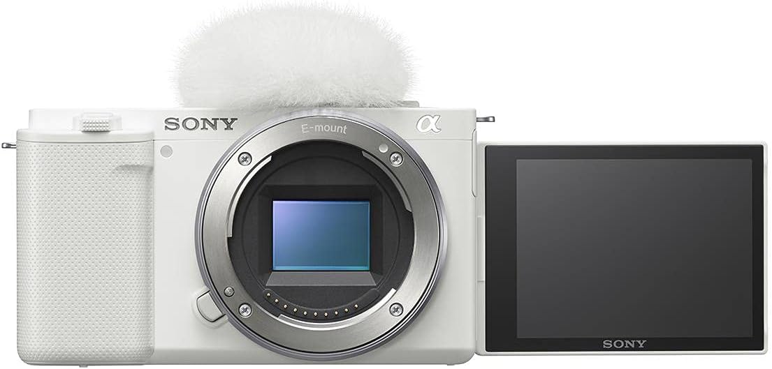 Sony ZV-E10 APS-C Mirrorless Interchangeable Lens Vlogging Camera, White - Bundle ACCVC1 Vlogger Accessory Kit (Shooting Grip  64GB UHS-II SDXC Card)
