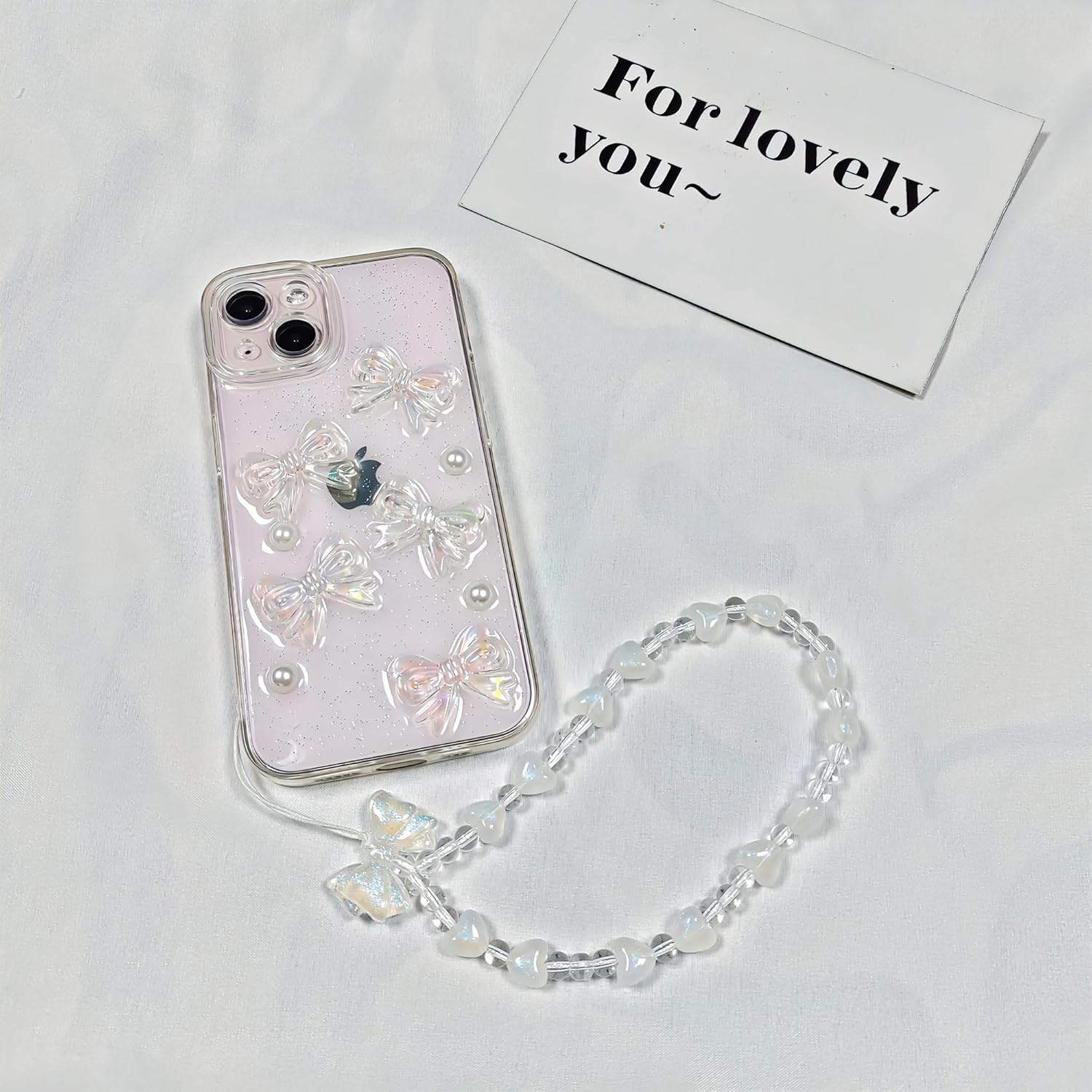Ownest compatibile con iPhone 13, custodia protettiva per telefono con simpatici fiocchi 3D trasparenti e motivi estetici perlati per donne e ragazze adolescenti, retro scintillante con glitter e protezione completa dell'obiettivo